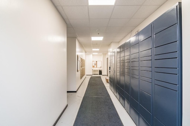 140 Chestnut St Unit 606, Springfield, MA 01103 - hall with a package area, a drop ceiling, and baseboards
