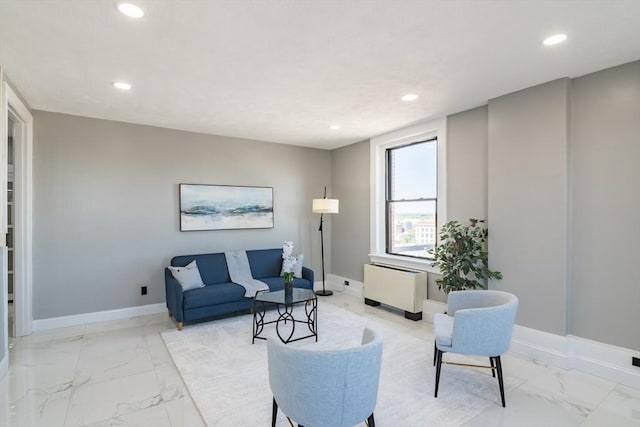 140 Chestnut St Unit 606, Springfield, MA 01103 - living room with light marble finish flooring, radiator heating unit, recessed lighting, and baseboards