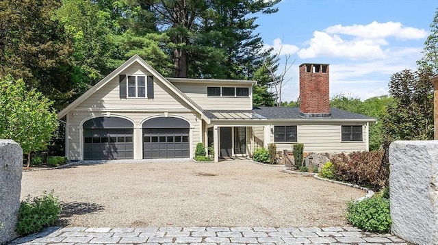 196 Elm St, Concord, MA 01742 - view of front of home with driveway and a chimney