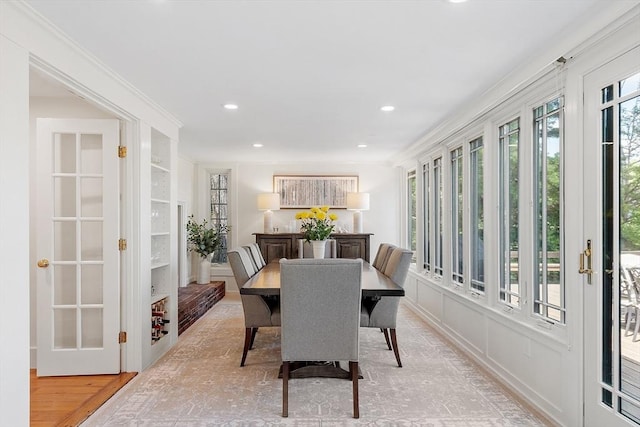 196 Elm St, Concord, MA 01742 - dining room with built in shelves, recessed lighting, and light wood-style flooring