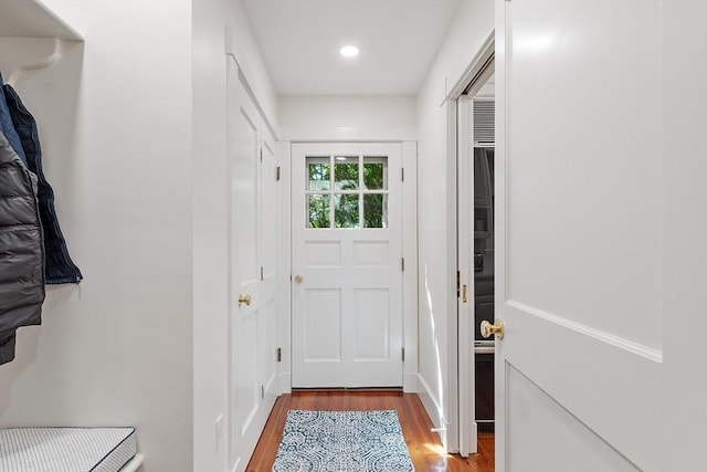 196 Elm St, Concord, MA 01742 - doorway to outside featuring wood finished floors and recessed lighting
