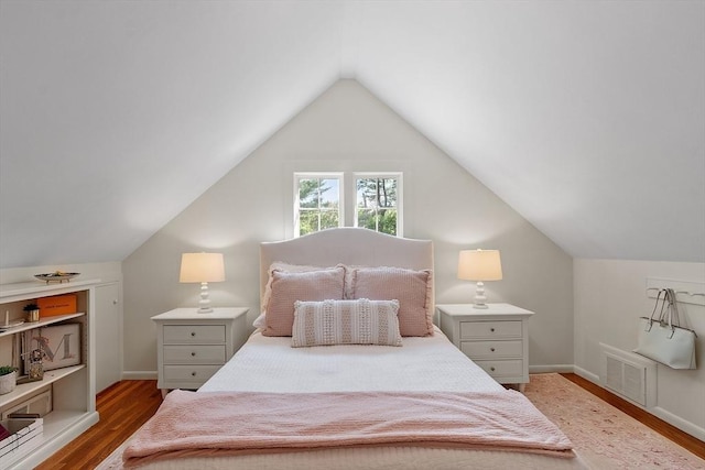 196 Elm St, Concord, MA 01742 - bedroom featuring light wood-style floors and lofted ceiling