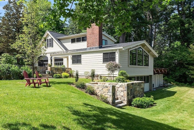 196 Elm St, Concord, MA 01742 - rear view of house featuring a chimney