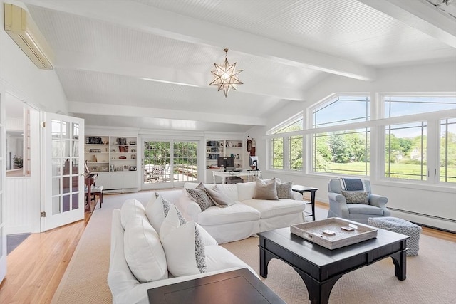 196 Elm St, Concord, MA 01742 - living area featuring a wall mounted air conditioner and light wood-type flooring