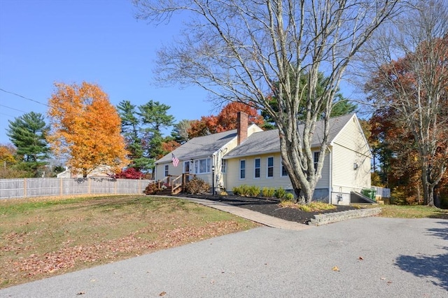 view of front of house with a front lawn