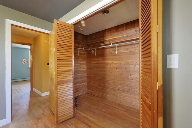 closet featuring baseboard heating
