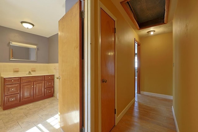 hallway featuring light wood finished floors