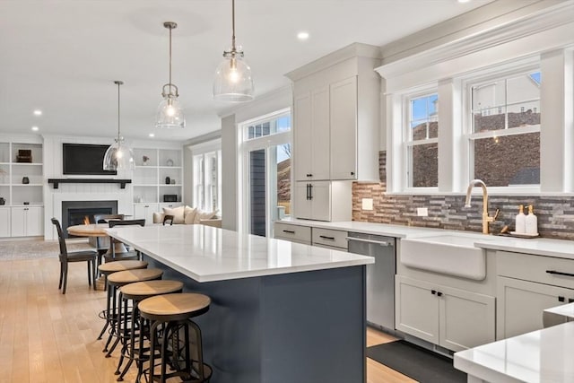 170 Lafayette Ave, Wrentham, MA 02093 - kitchen with dishwasher, a kitchen island, recessed lighting, open floor plan, and tasteful backsplash