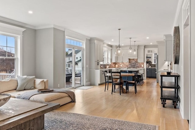 170 Lafayette Ave, Wrentham, MA 02093 - living room with light wood-style floors, recessed lighting, and ornamental molding