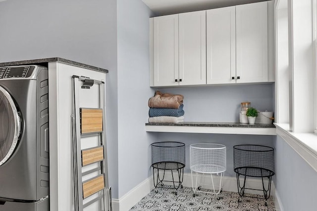 170 Lafayette Ave, Wrentham, MA 02093 - washroom with washer / clothes dryer, cabinet space, and tile patterned floors