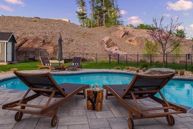170 Lafayette Ave, Wrentham, MA 02093 - view of pool with a storage shed, a patio, and a fenced backyard