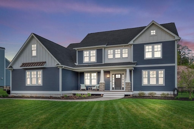 170 Lafayette Ave, Wrentham, MA 02093 - view of front of home featuring board and batten siding, covered porch, a yard, and a shingled roof