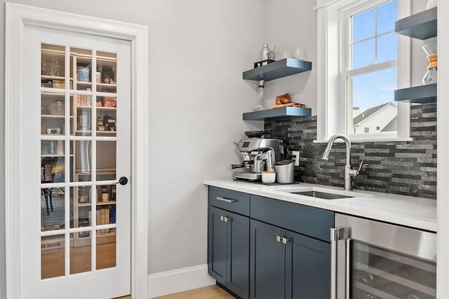 170 Lafayette Ave, Wrentham, MA 02093 - indoor wet bar featuring wine cooler and tasteful backsplash