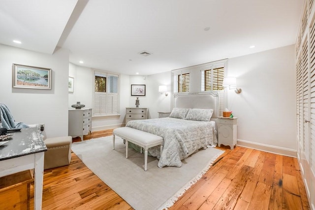 bedroom with light hardwood / wood-style floors