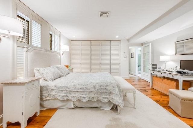 bedroom with light wood-type flooring