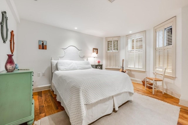 bedroom featuring hardwood / wood-style flooring