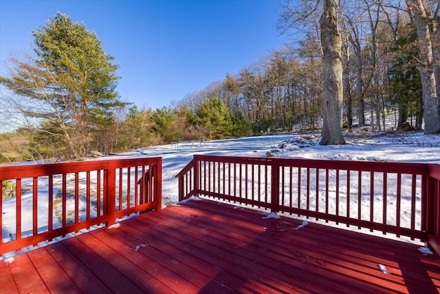 view of snow covered deck