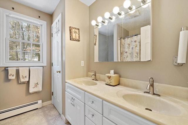 bathroom featuring vanity and baseboard heating