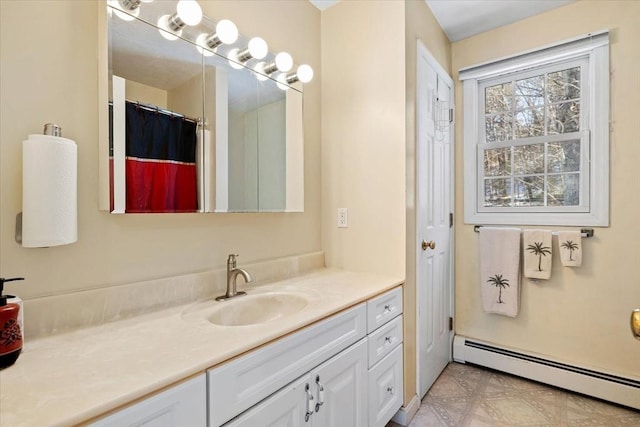 bathroom with vanity, curtained shower, and baseboard heating