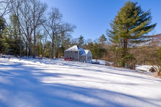 view of yard covered in snow