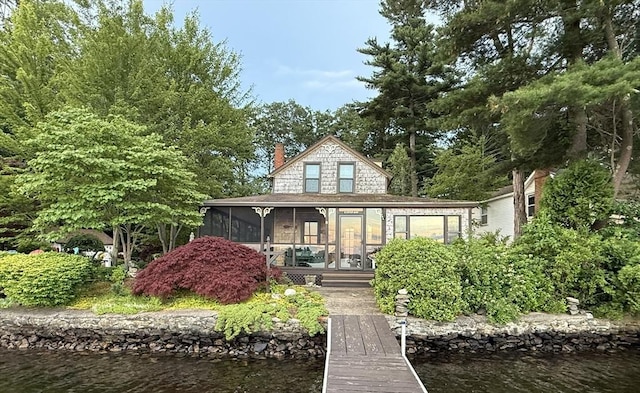 8 Long Is, Webster, MA 01570 - back of property featuring a sunroom, a chimney, and a water view
