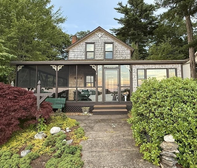 8 Long Is, Webster, MA 01570 - back of property with a sunroom and a chimney