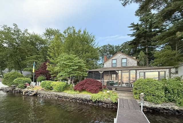 8 Long Is, Webster, MA 01570 - back of house with a sunroom, a water view, and a chimney