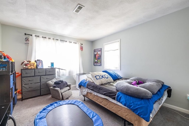 27 Harrison St Unit C, Boston, MA 02131 - carpeted bedroom with a textured ceiling