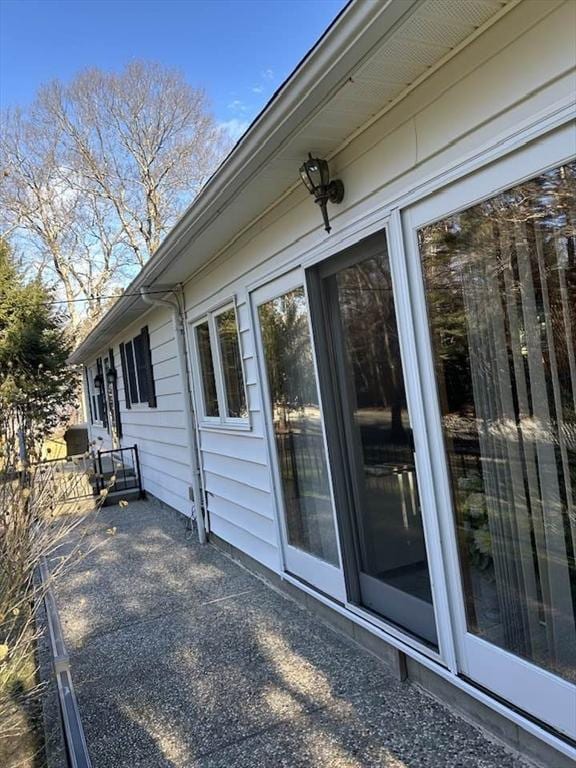 doorway to property featuring a patio