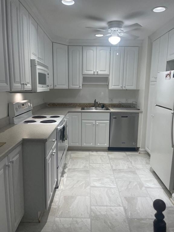 766 Willard St Unit A7, Quincy, MA 02169 - kitchen with white appliances, a sink, a ceiling fan, recessed lighting, and white cabinetry