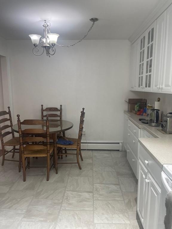 766 Willard St Unit A7, Quincy, MA 02169 - dining area featuring baseboard heating, a chandelier, and light floors