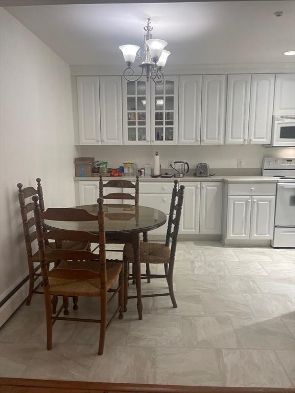 766 Willard St Unit A7, Quincy, MA 02169 - dining room with a chandelier