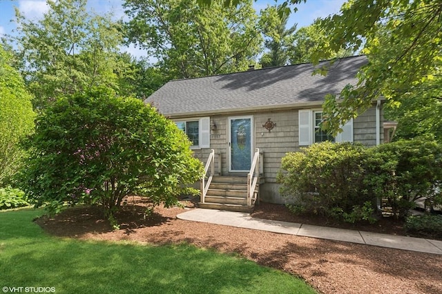 157 Hall St, Mansfield, MA 02048 - view of front of home featuring roof with shingles, a front lawn, and entry steps