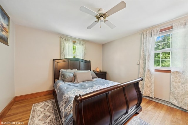 157 Hall St, Mansfield, MA 02048 - bedroom with light wood-type flooring, ceiling fan, and baseboards