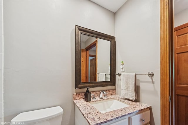 157 Hall St, Mansfield, MA 02048 - half bathroom featuring vanity and toilet