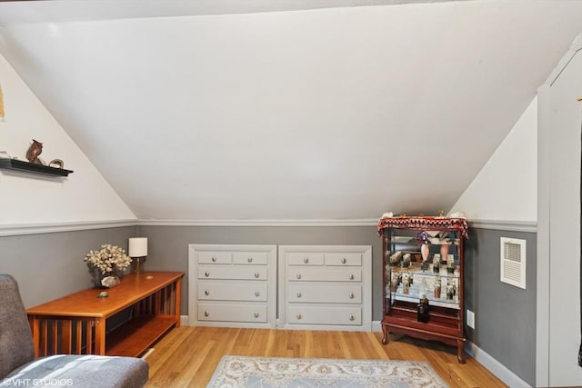157 Hall St, Mansfield, MA 02048 - living area featuring light wood-type flooring, baseboards, and vaulted ceiling