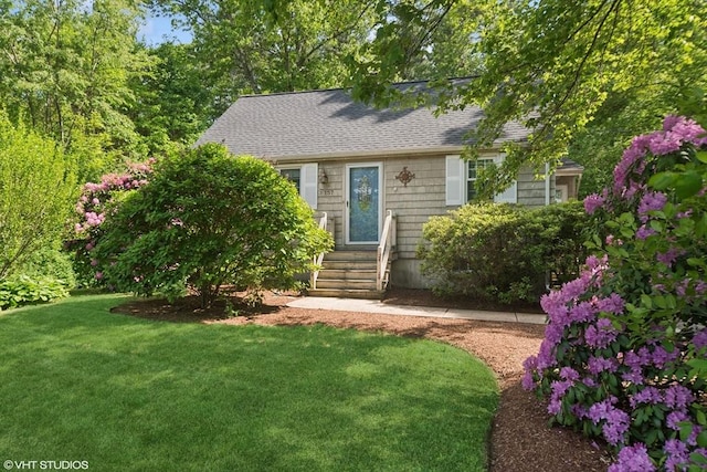 157 Hall St, Mansfield, MA 02048 - view of front of property with a front lawn, entry steps, and roof with shingles