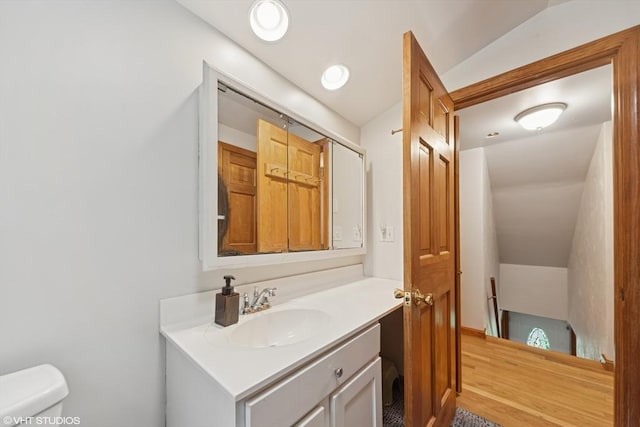 157 Hall St, Mansfield, MA 02048 - bathroom with toilet, vanity, and lofted ceiling