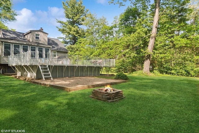 157 Hall St, Mansfield, MA 02048 - view of green lawn with a deck, an outdoor fire pit, and stairway