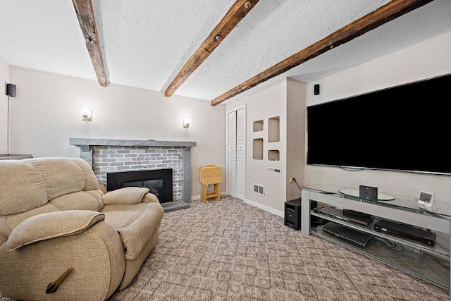 carpeted living area featuring a fireplace, beamed ceiling, and baseboards