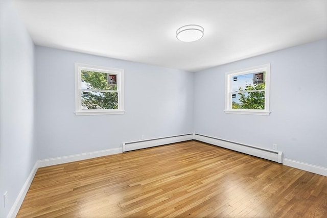 69 Kingman Ave, Revere, MA 02151 - unfurnished room with light wood-type flooring and baseboard heating