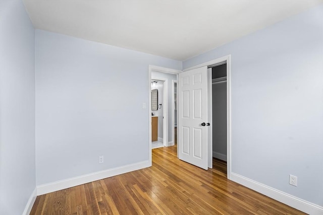 69 Kingman Ave, Revere, MA 02151 - unfurnished bedroom with wood finished floors and a closet