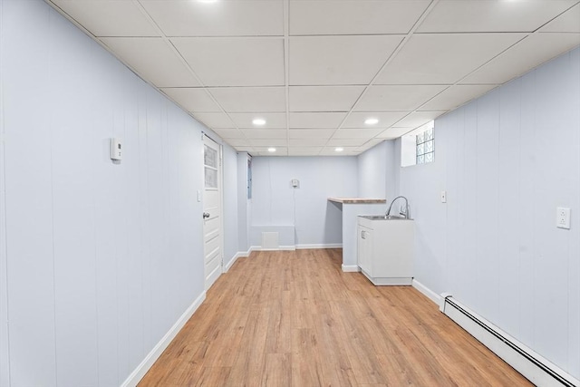69 Kingman Ave, Revere, MA 02151 - washroom featuring a baseboard radiator, light wood-style flooring, and recessed lighting