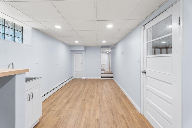 69 Kingman Ave, Revere, MA 02151 - hallway with a baseboard radiator, light wood-style floors, and recessed lighting