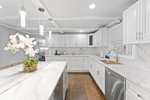 kitchen featuring decorative backsplash, light stone countertops, dark hardwood / wood-style flooring, white cabinets, and dishwasher