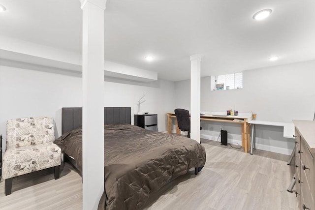 bedroom with light hardwood / wood-style flooring