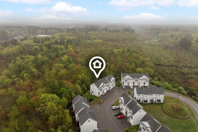 drone / aerial view of a heavily wooded area