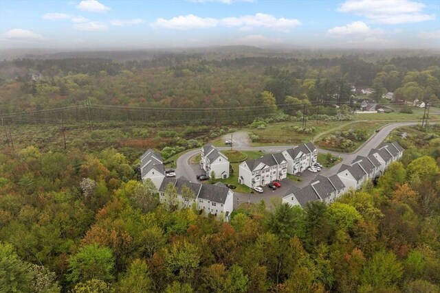 drone / aerial view of a heavily wooded area