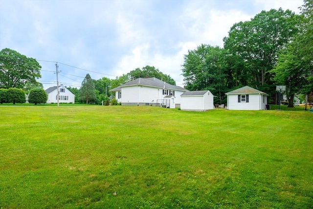 99 Oak St, North Attleboro, MA 02760 - view of green lawn featuring an outdoor structure
