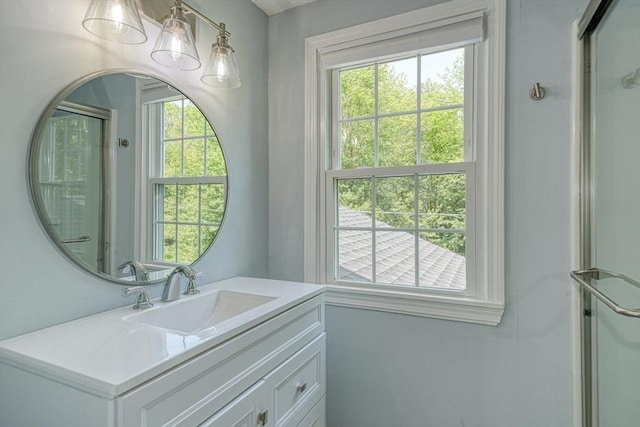 216 Davis St, Northborough, MA 01532 - bathroom featuring vanity and a shower with door